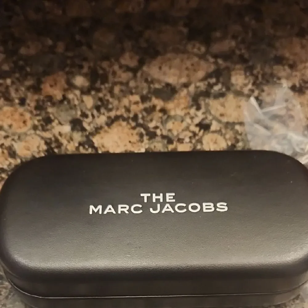 Marc Jacobs Transparent Frame Sunglasses with Dark Lenses
